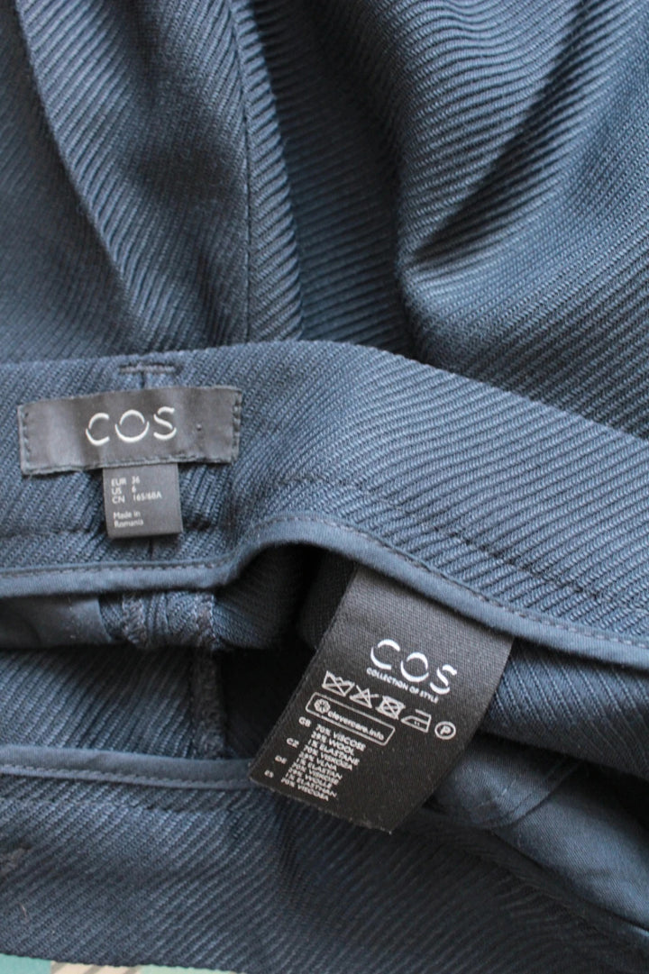 COS high-waisted tailored trousers black grey premium wool blend pleated design