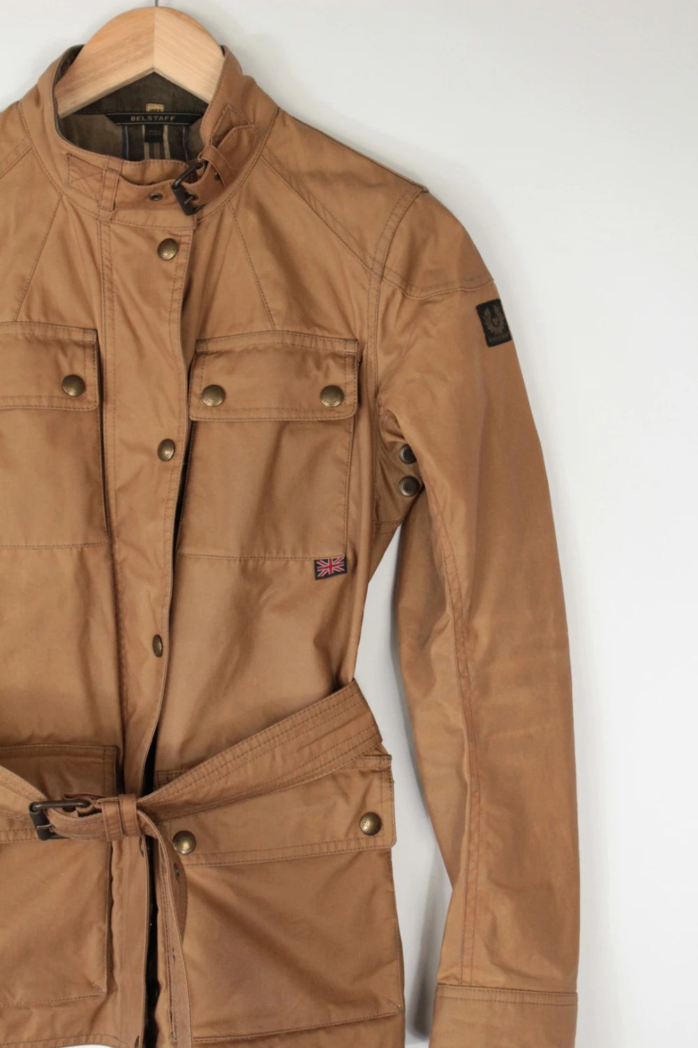 Belstaff brown waxed cotton motorcycle jacket with corduroy collar and matching waist belt.