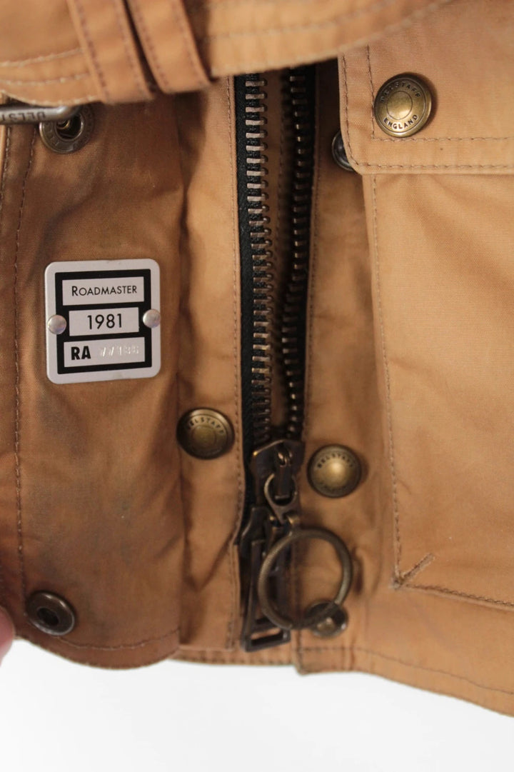Belstaff brown waxed cotton motorcycle jacket with corduroy collar and matching waist belt.