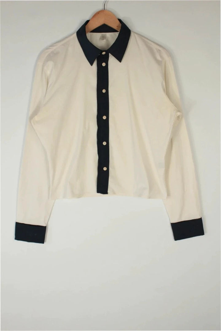 Miu Miu cream and navy collared blouse with contrast trim and premium cotton blend.