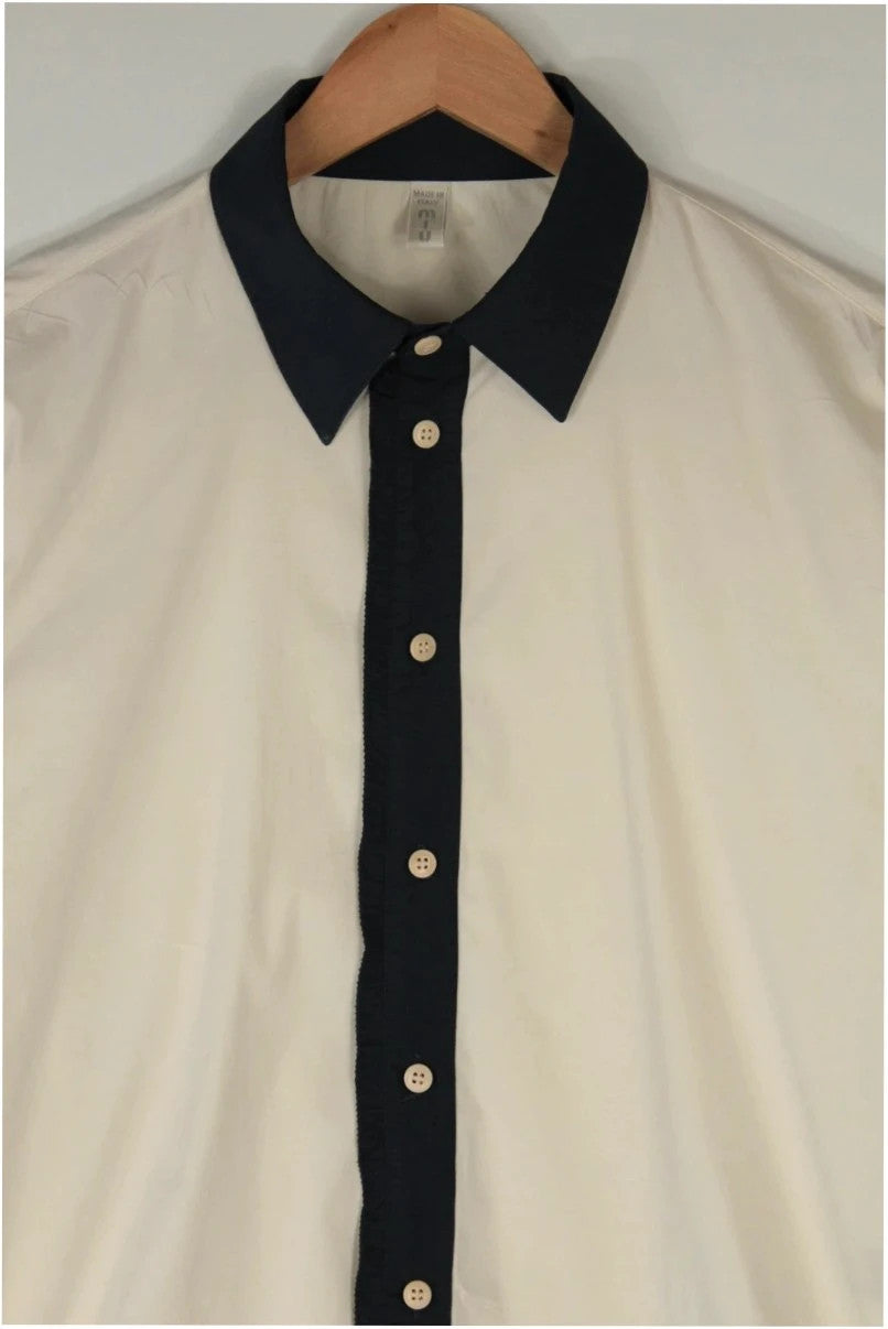 Miu Miu cream and navy collared blouse with contrast trim and premium cotton blend.