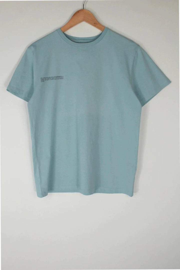 Pangaia light blue mint green pocket t-shirt with minimalist text block design.