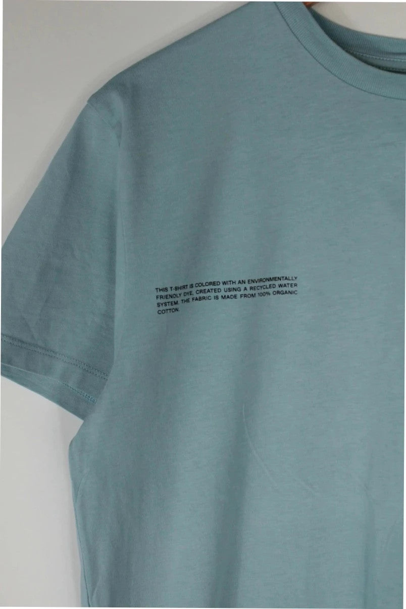 Pangaia light blue mint green pocket t-shirt with minimalist text block design.