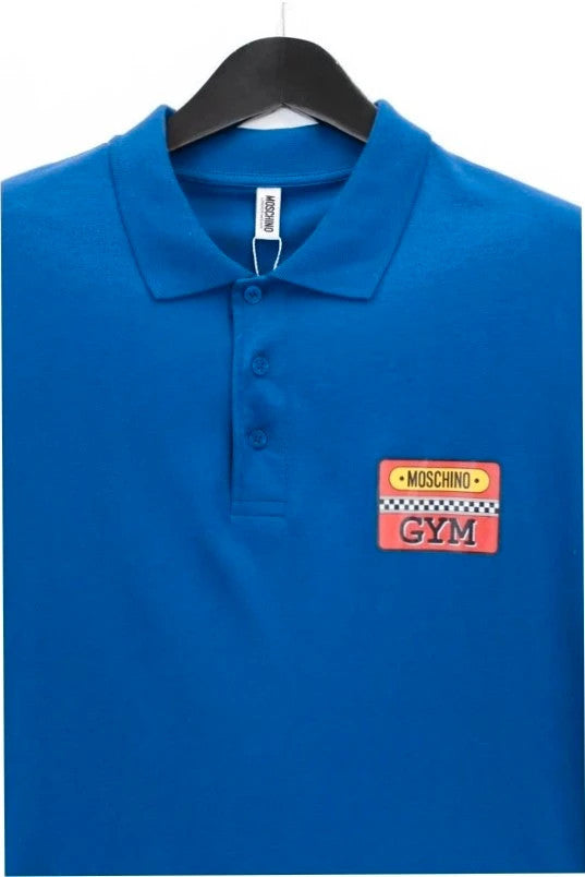 Moschino blue polo shirt with embroidered Moschino Gym patch and breathable cotton piqué.