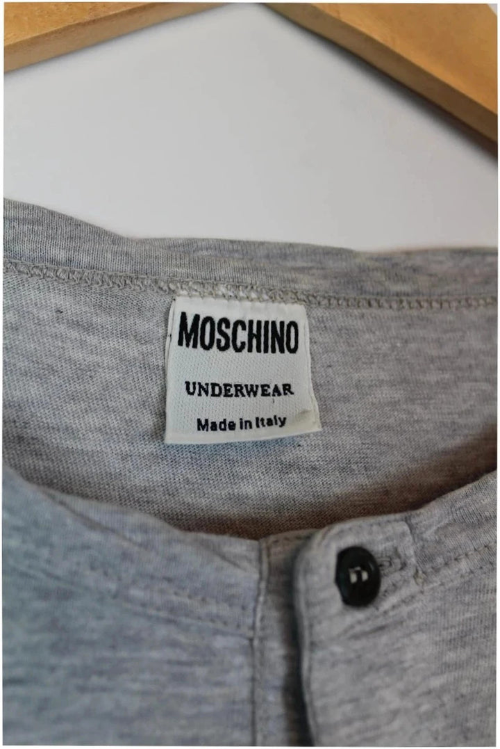 Moschino grey cotton polo shirt with rounded neckline and two front buttons, vintage style.