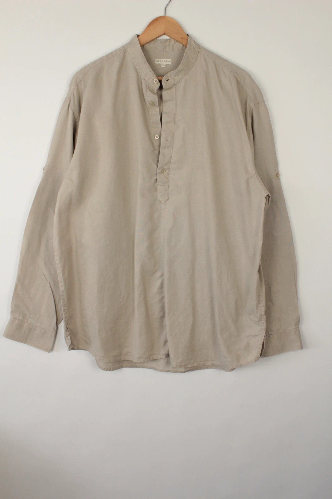 Okanagan men's popover shirt beige khaki lightweight linen with grandfather collar and button detailing.