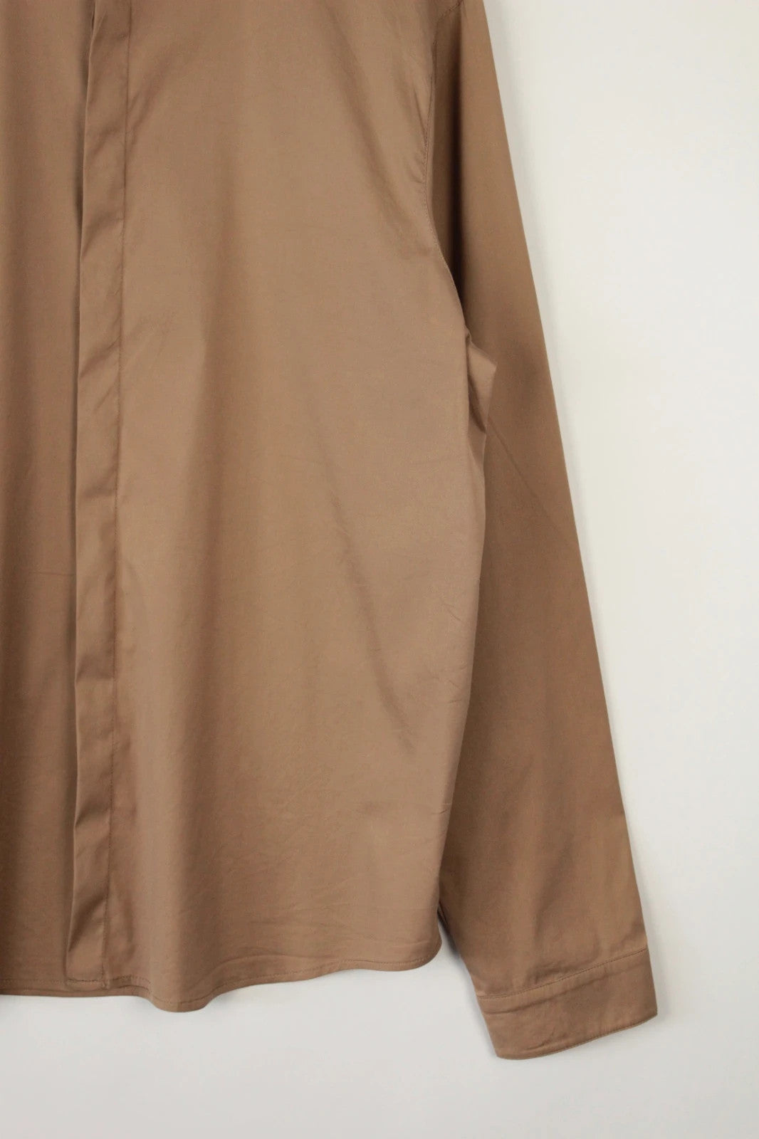 Prada beige stretch cotton shirt with hidden placket and sharp pointed collar.