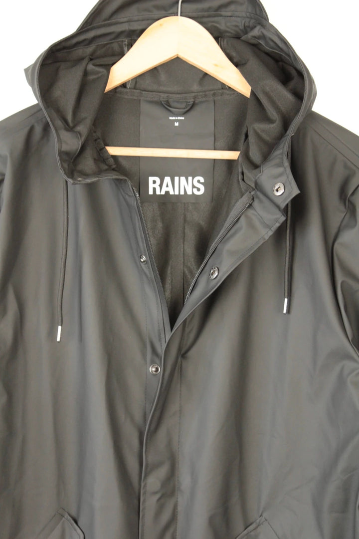 Rains black fishtail parka jacket with adjustable hood and matte finish.