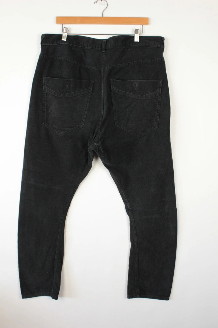 Denim & Co. black wide-leg trousers with drop-crotch design and oversized utility pockets.
