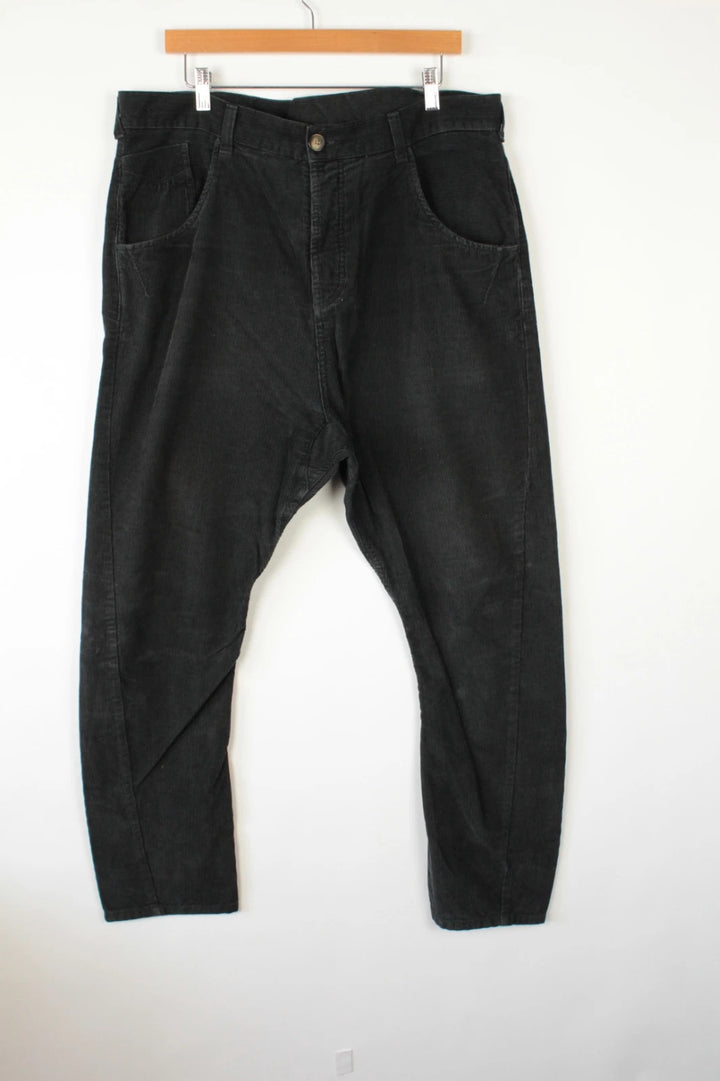 Denim & Co. black wide-leg trousers with drop-crotch design and oversized utility pockets.