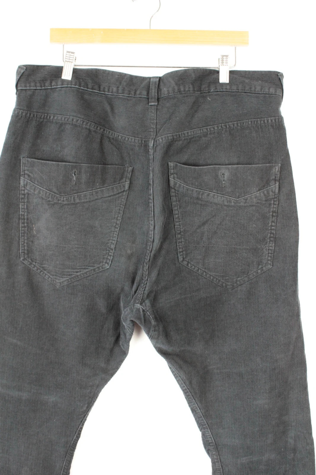 Denim & Co. black wide-leg trousers with drop-crotch design and oversized utility pockets.