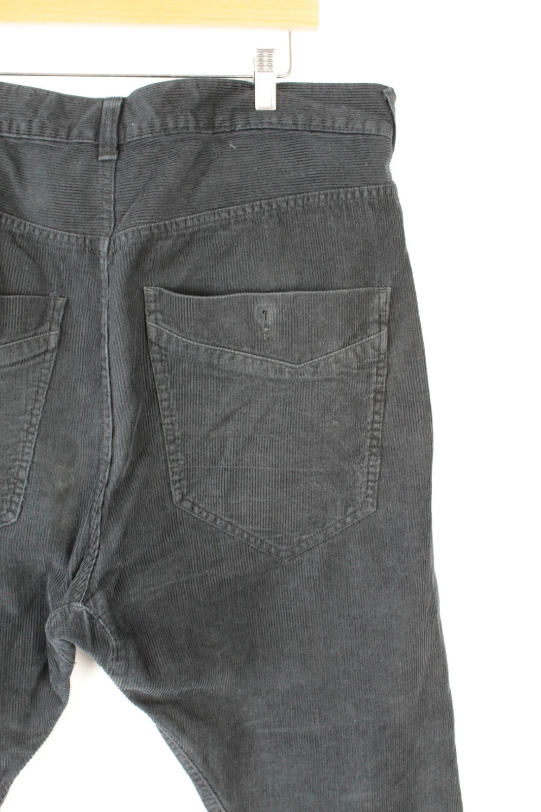Denim & Co. black wide-leg trousers with drop-crotch design and oversized utility pockets.