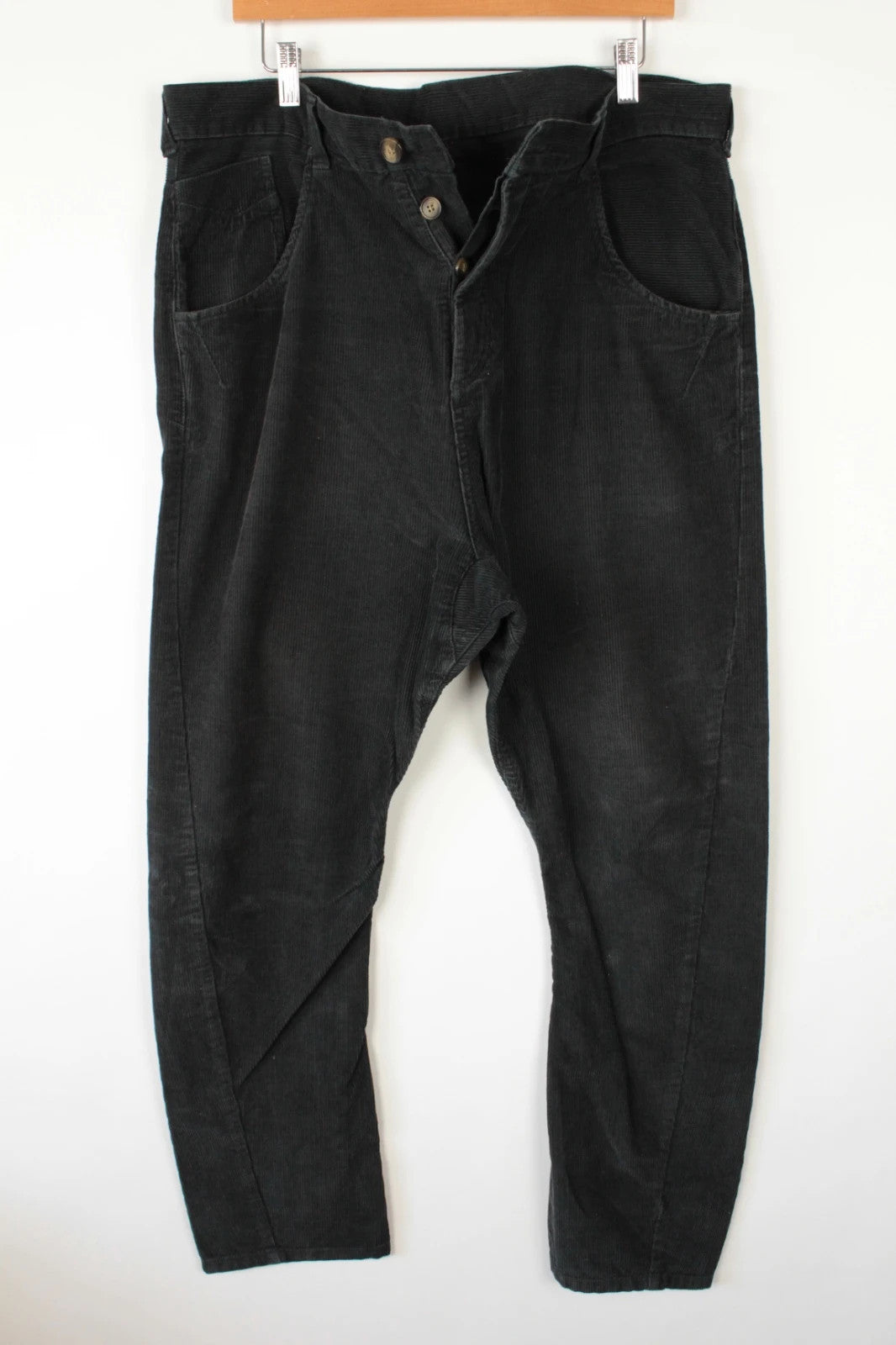 Denim & Co. black wide-leg trousers with drop-crotch design and oversized utility pockets.