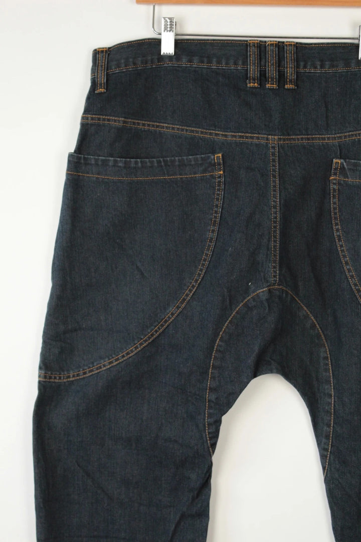 Aqua navy drop crotch 3/4 denim shorts with curved pockets and contrast tobacco stitching.