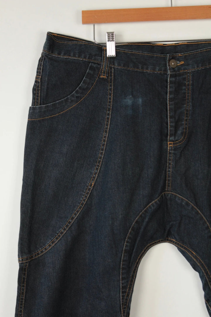Aqua navy drop crotch 3/4 denim shorts with curved pockets and contrast tobacco stitching.