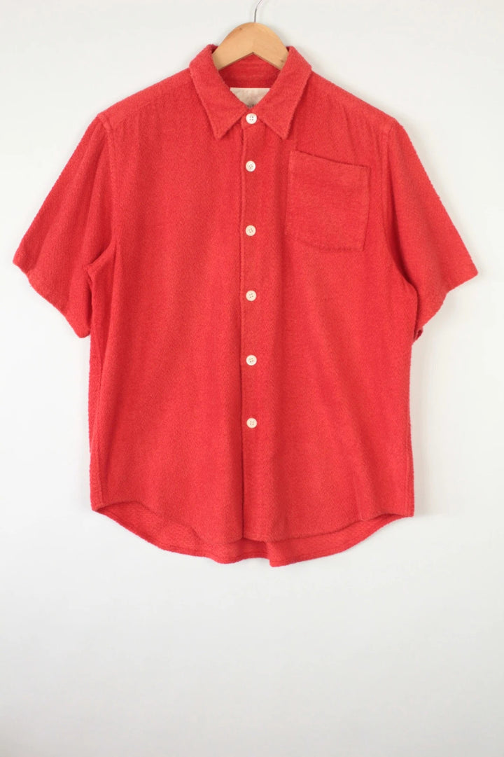 Comme des Garçons short sleeve shirt coral red terry towelling fabric with chest pocket.