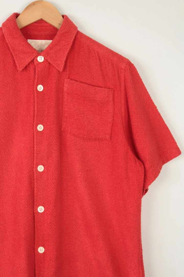 Comme des Garçons short sleeve shirt coral red terry towelling fabric with chest pocket.