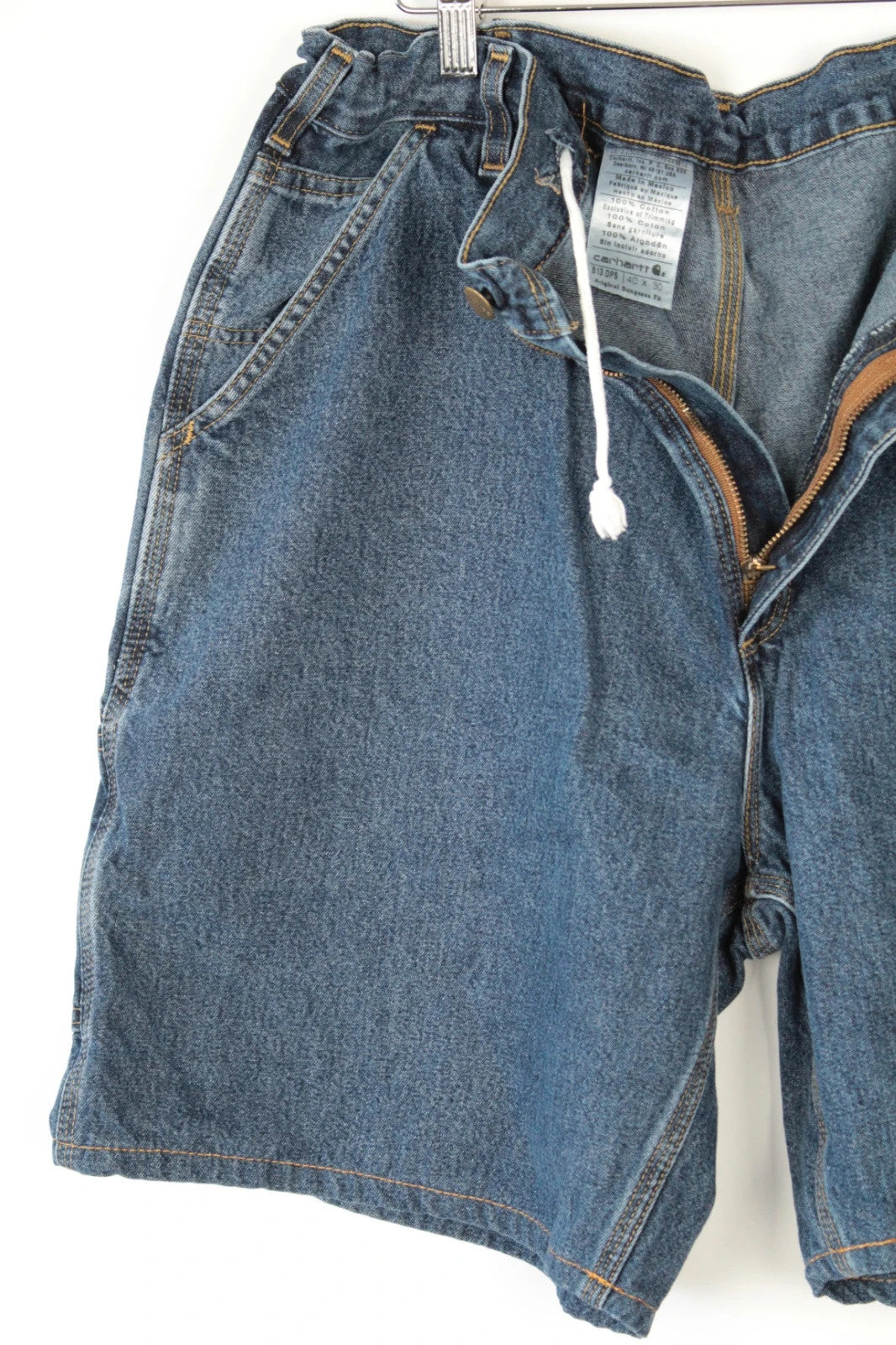 Carhartt blue denim shorts with elastic drawstring waist and leatherette logo patch.