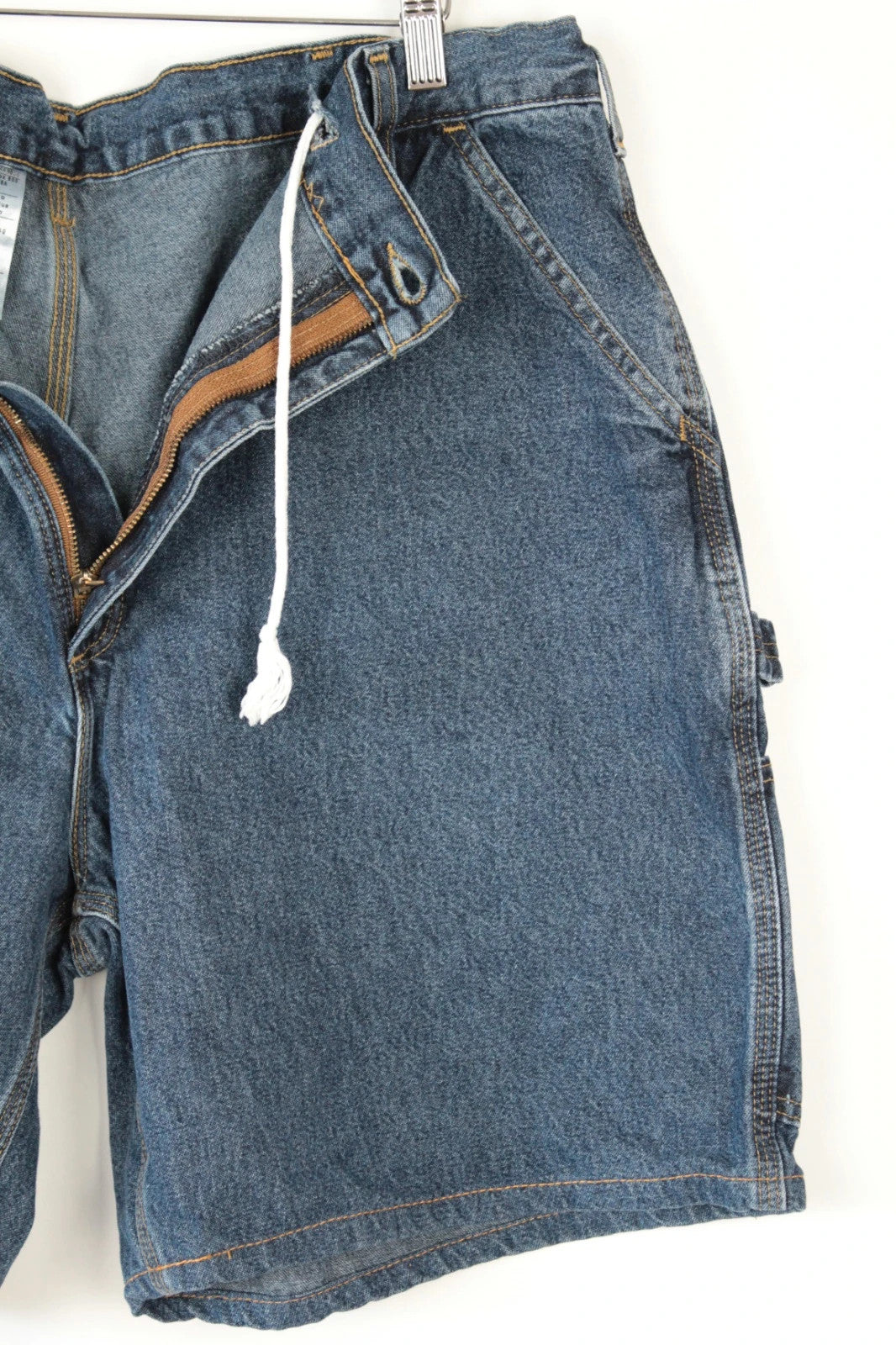 Carhartt blue denim shorts with elastic drawstring waist and leatherette logo patch.