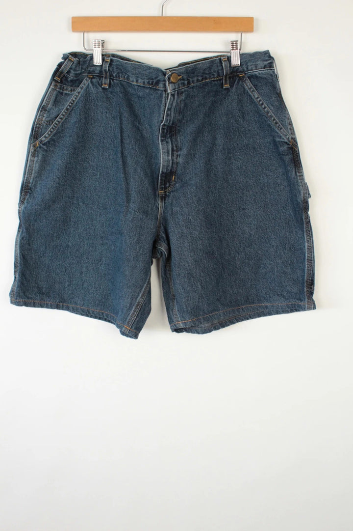 Carhartt blue denim shorts with elastic drawstring waist and leatherette logo patch.