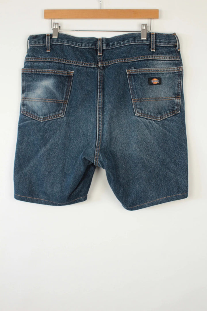 Dickies blue denim shorts with elastic drawstring waist and woven horseshoe logo patch.