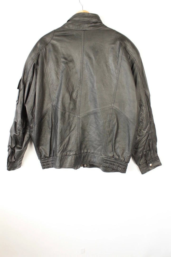 Vintage Dressing black bomber jacket, genuine leather, heavyweight, with utility arm pocket and satin lining.