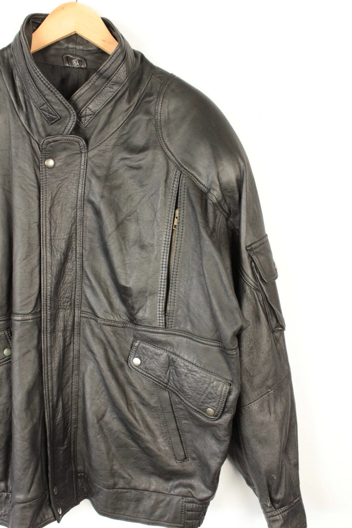Vintage Dressing black bomber jacket, genuine leather, heavyweight, with utility arm pocket and satin lining.