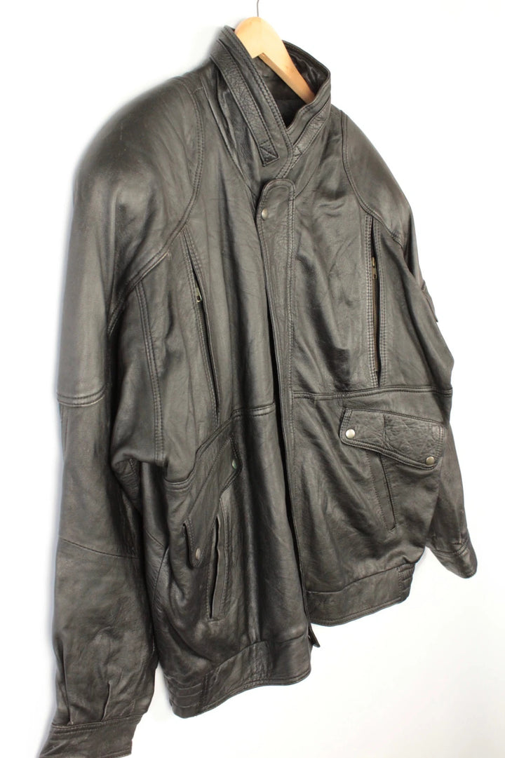 Vintage Dressing black bomber jacket, genuine leather, heavyweight, with utility arm pocket and satin lining.
