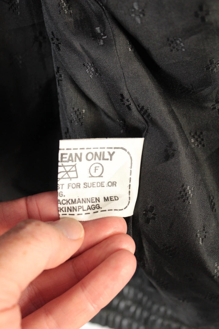 Vintage Dressing black bomber jacket, genuine leather, heavyweight, with utility arm pocket and satin lining.