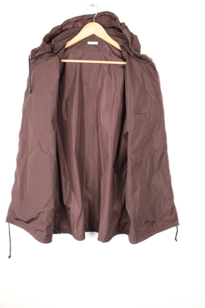 Dries Van Noten brown windbreaker jacket with multi-coloured chevron stripes and silver zipper.