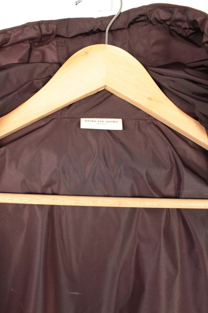 Dries Van Noten brown windbreaker jacket with multi-coloured chevron stripes and silver zipper.