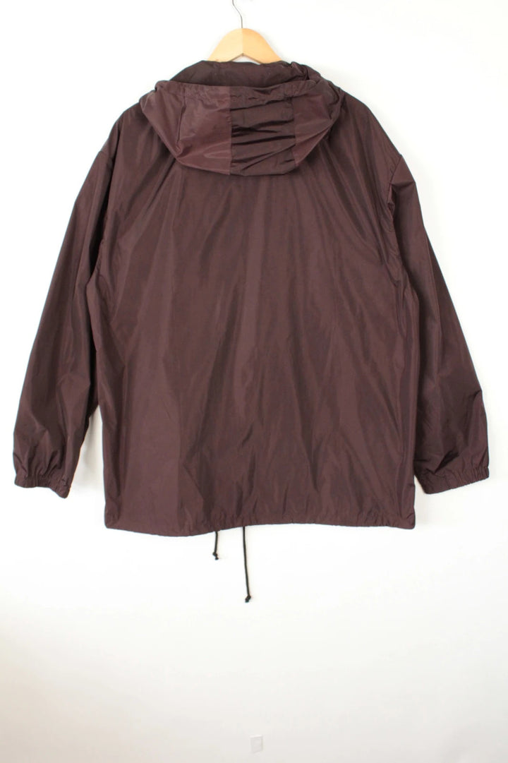 Dries Van Noten brown windbreaker jacket with multi-coloured chevron stripes and silver zipper.