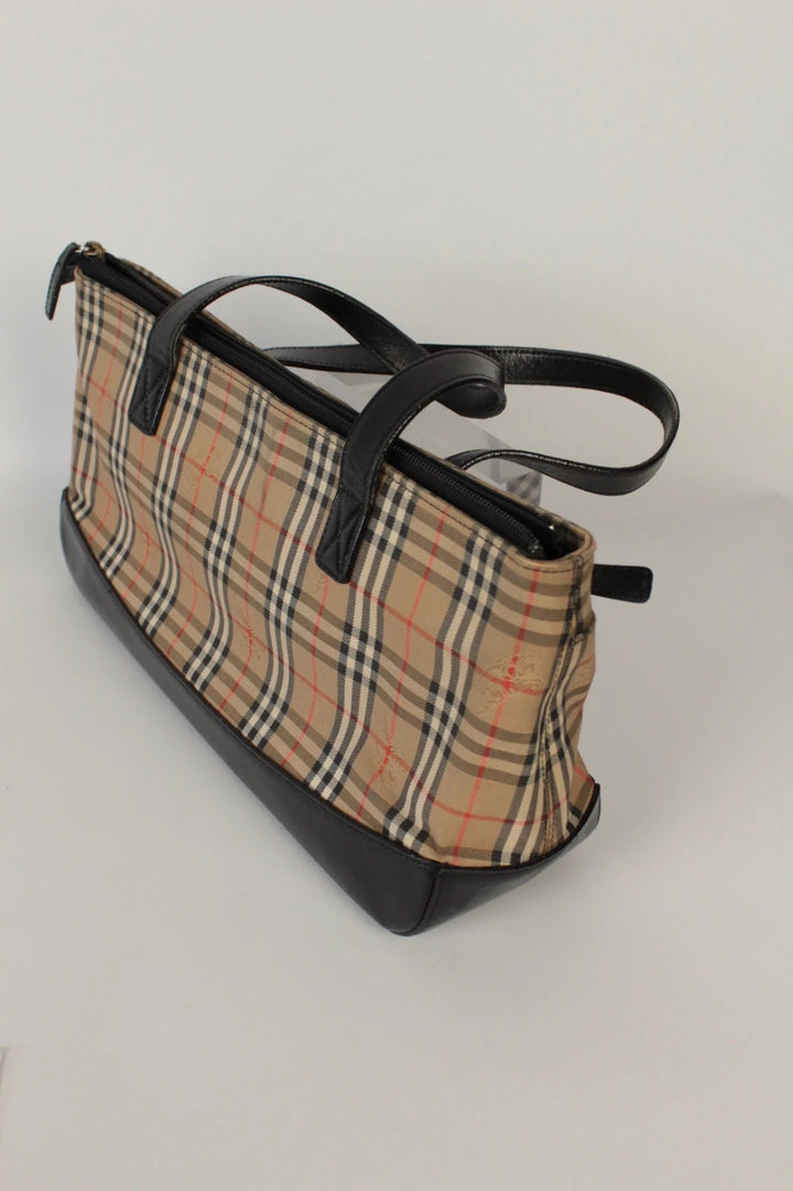 Burberry beige Nova Check tote bag with black leather base and shoulder straps.