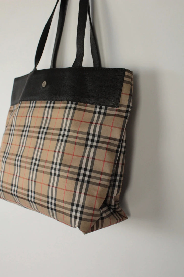 Burberry beige and black large shopper tote with iconic Nova Check pattern and leather trim.