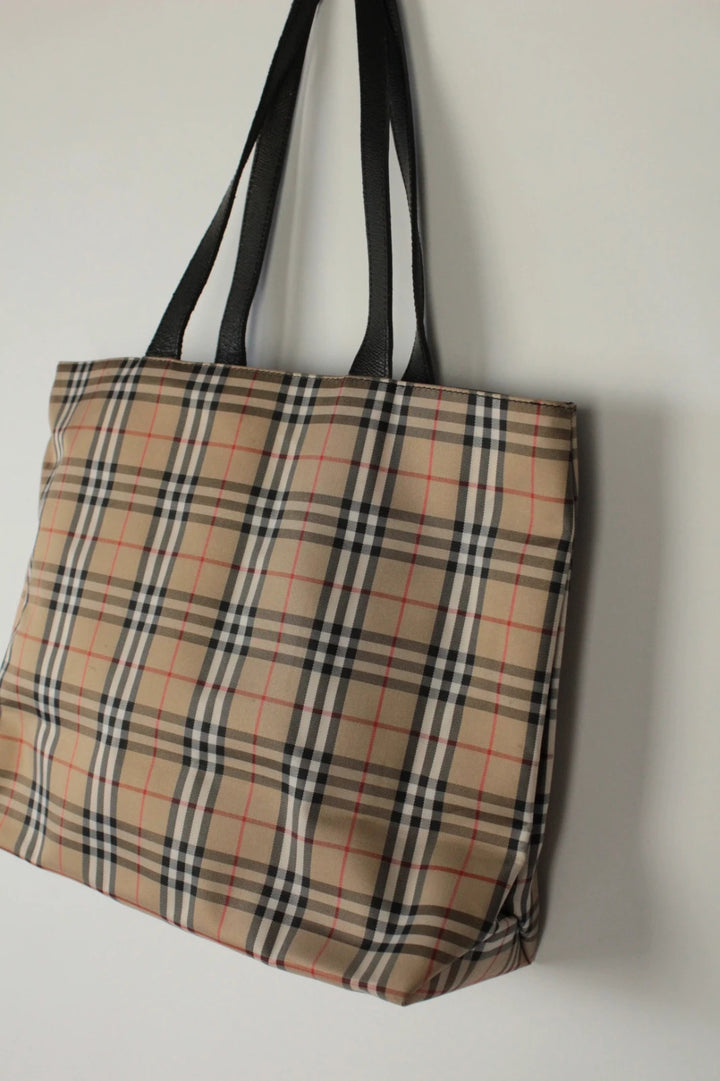 Burberry beige and black large shopper tote with iconic Nova Check pattern and leather trim.