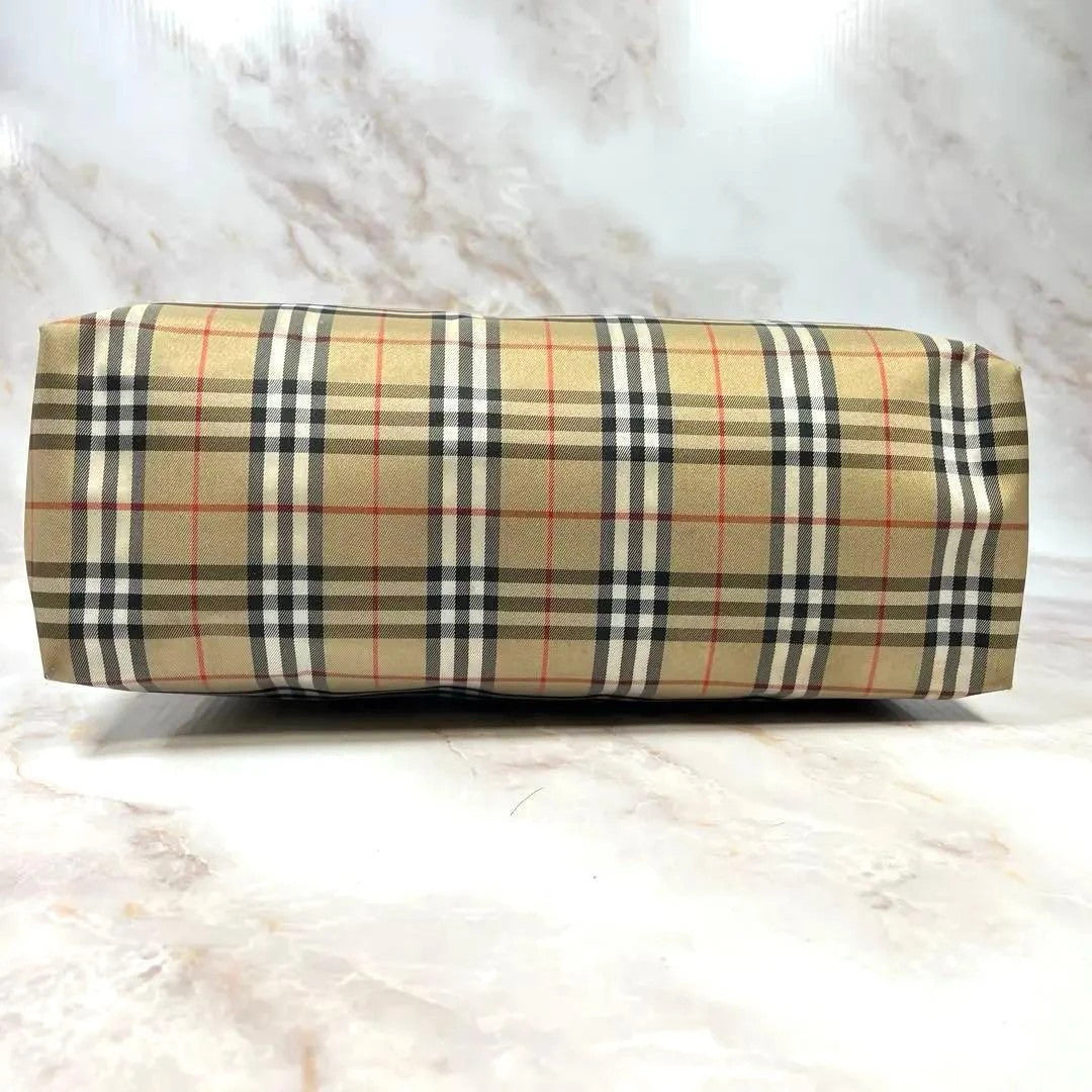 Burberry beige and black large shopper tote with iconic Nova Check pattern and leather trim.
