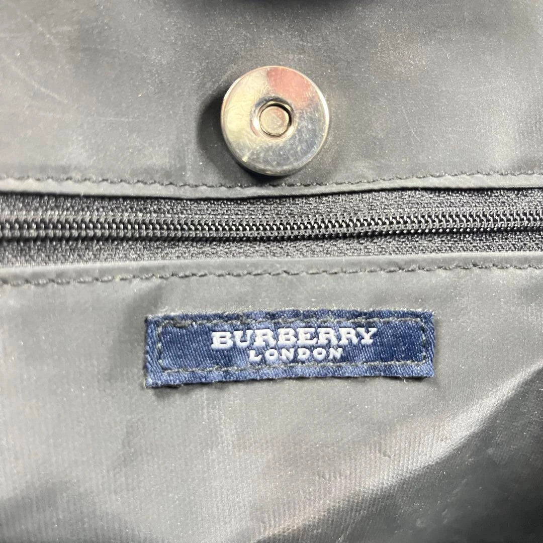 Burberry beige and black large shopper tote with iconic Nova Check pattern and leather trim.