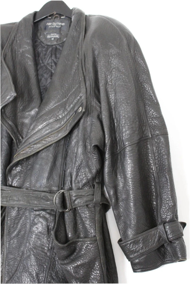Marc Buchanan black leather belted trench coat with textured grain and deep lapels.