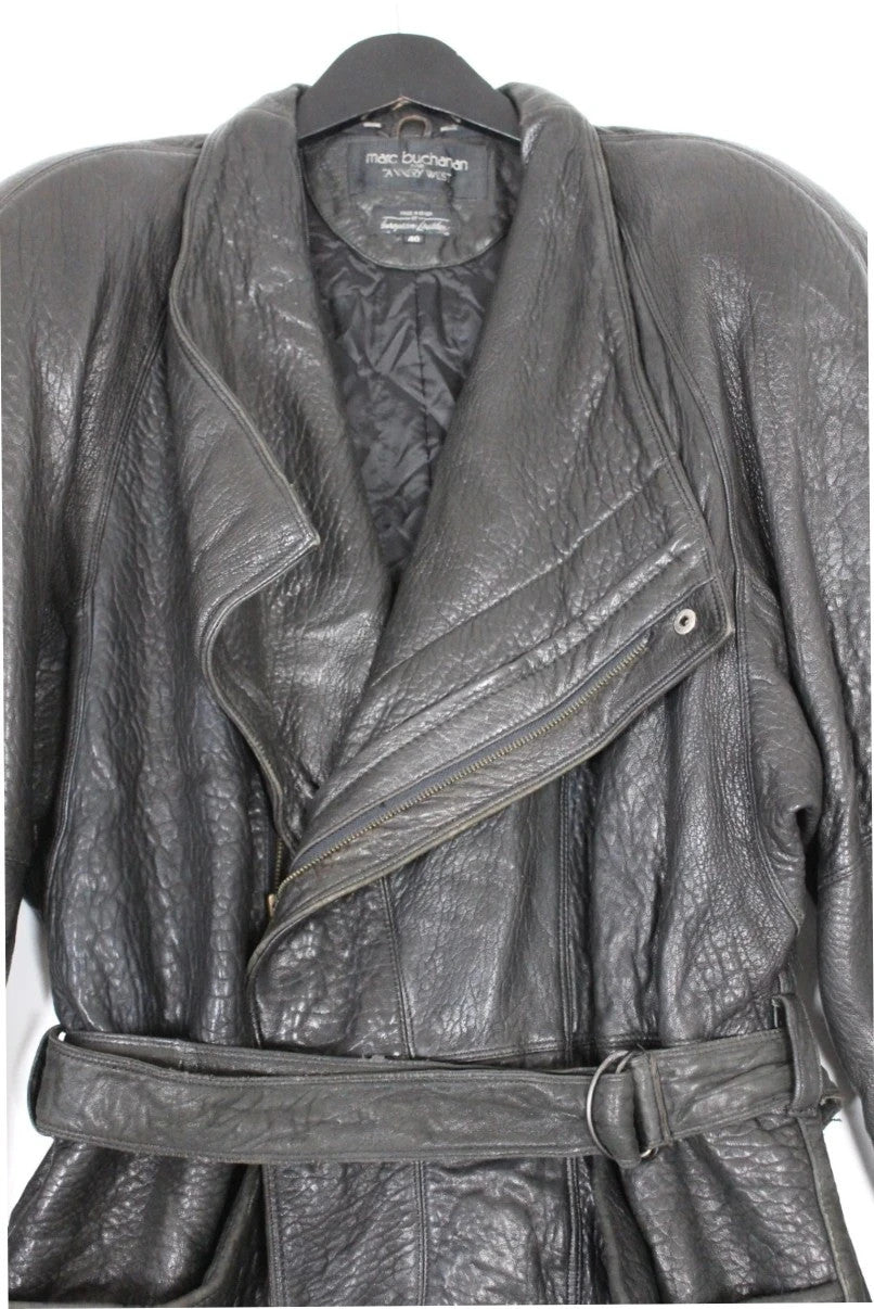 Marc Buchanan black leather belted trench coat with textured grain and deep lapels.