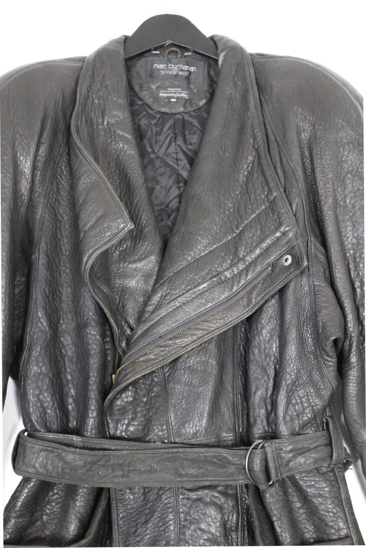 Marc Buchanan black leather belted trench coat with textured grain and deep lapels.