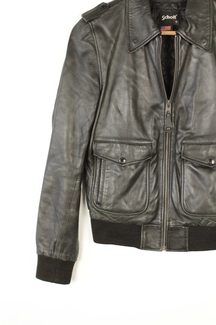 Schott black leather flight bomber jacket with ribbed cuffs and smooth front zip.