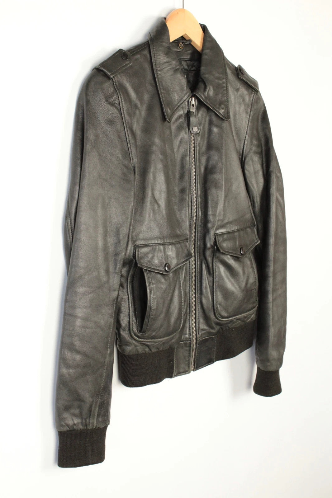 Schott black leather flight bomber jacket with ribbed cuffs and smooth front zip.