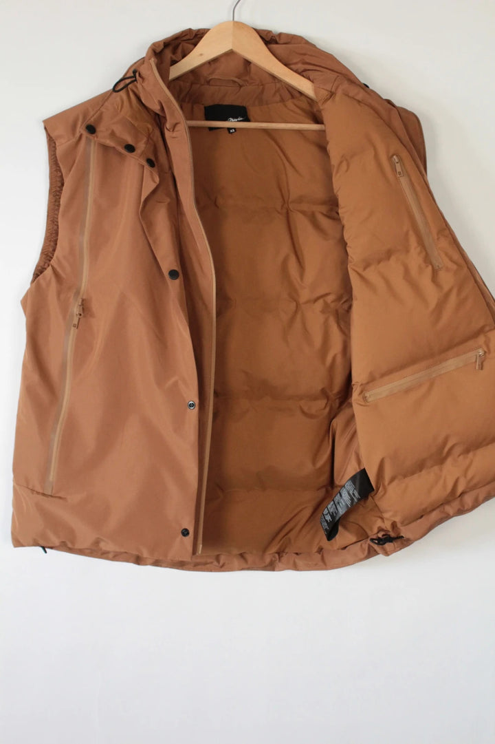3.1 Phillip Lim brown puffer gilet vest with high-neck toggles and waterproof side-zip pockets.