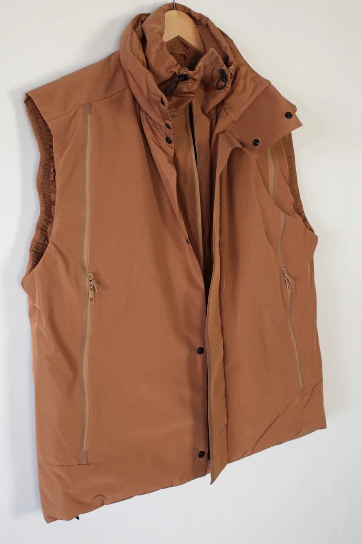 3.1 Phillip Lim brown puffer gilet vest with high-neck toggles and waterproof side-zip pockets.