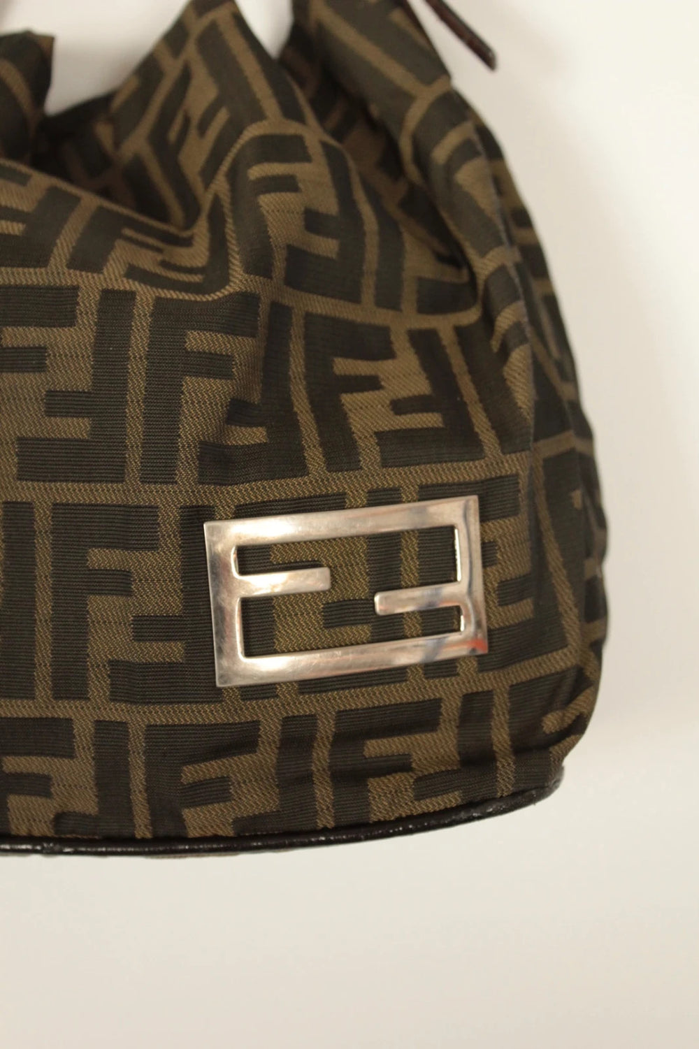 Fendi black and brown Zucca canvas hobo bag with FF monogram and leather trim.