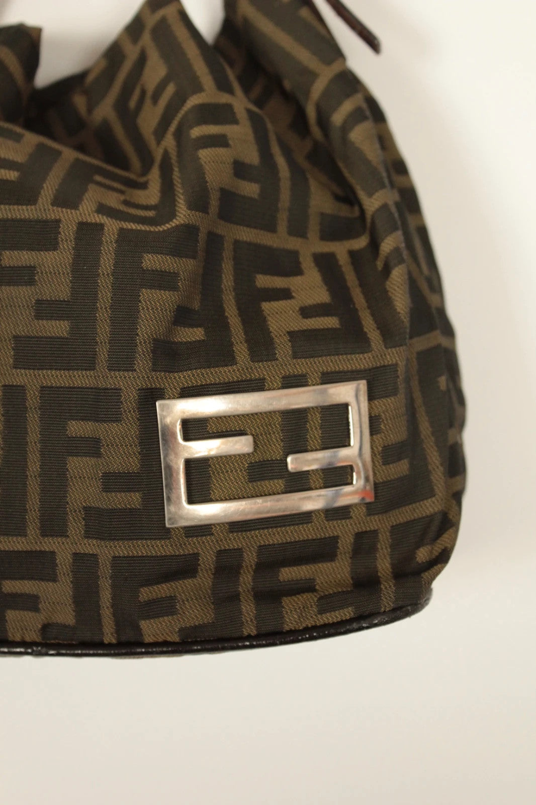 Fendi black and brown Zucca canvas hobo bag with FF monogram and leather trim.