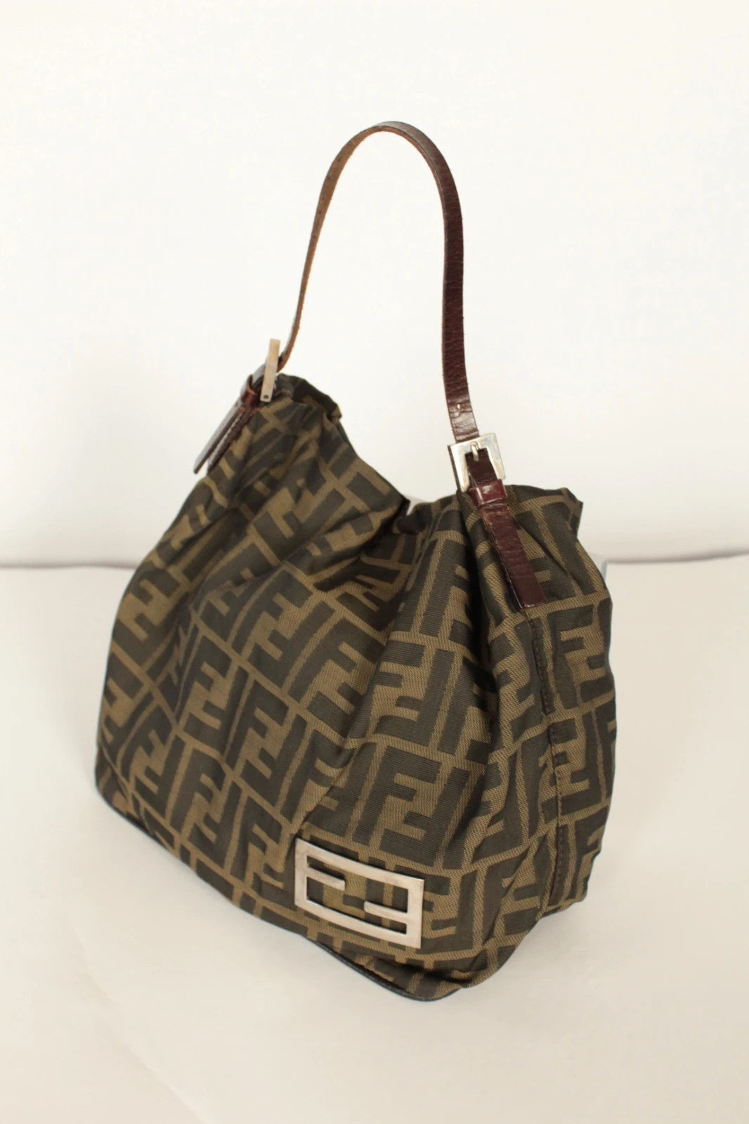 Fendi black and brown Zucca canvas hobo bag with FF monogram and leather trim.
