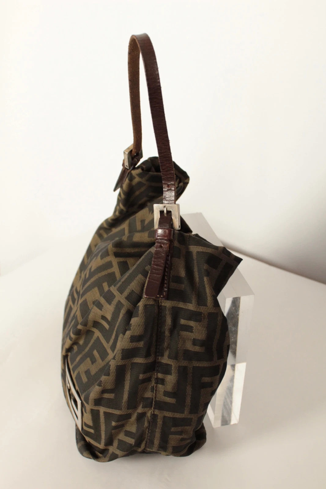 Fendi black and brown Zucca canvas hobo bag with FF monogram and leather trim.