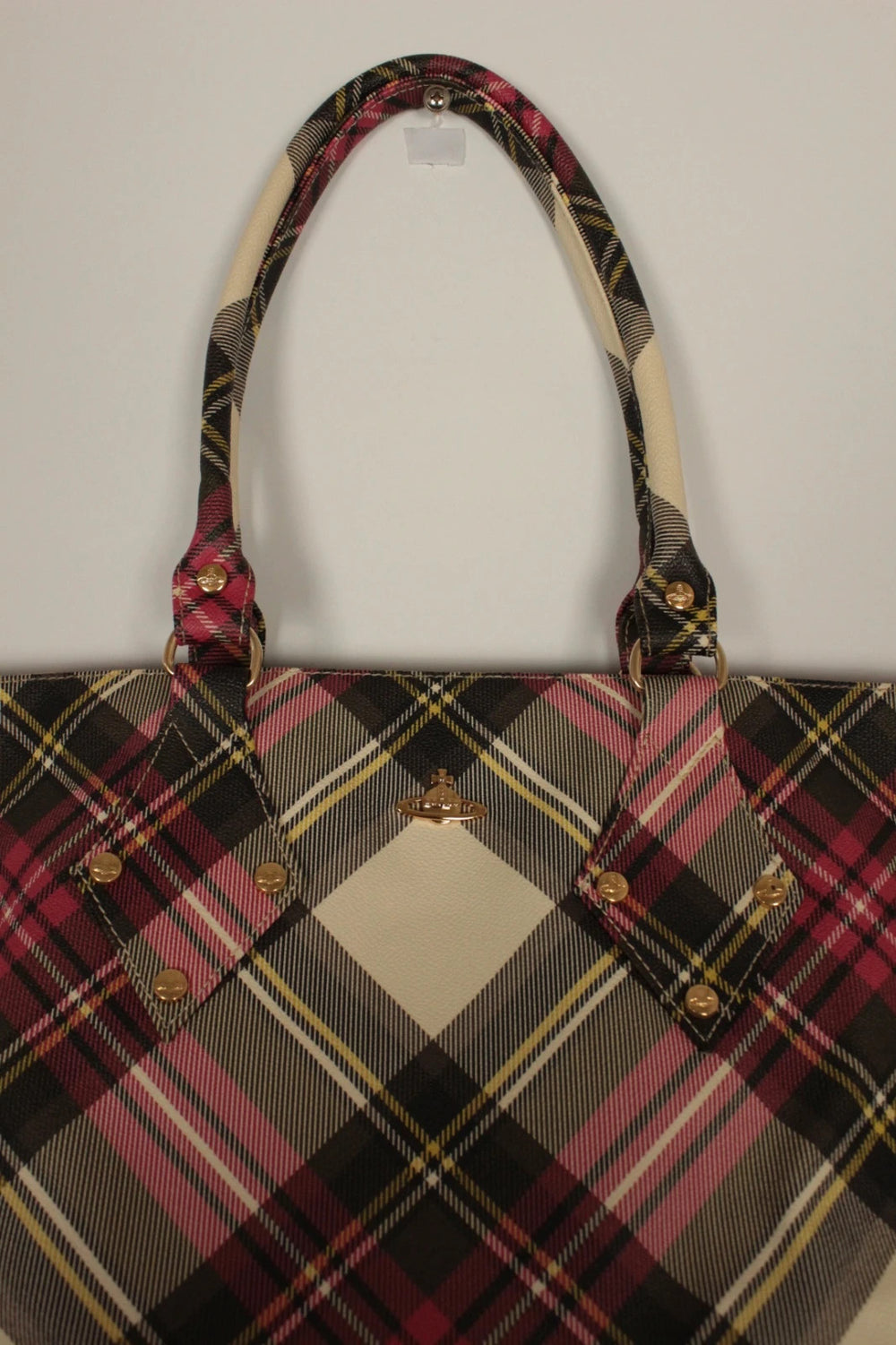 Vivienne Westwood multi checkered handbag with iconic Orb logo and leather accents.