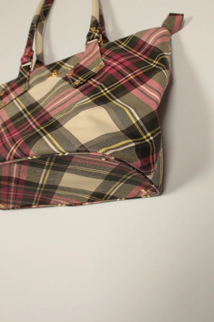 Vivienne Westwood multi checkered handbag with iconic Orb logo and leather accents.